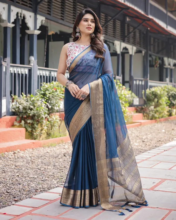 Deep_Navy_Blue_Plain_Chiffon_Saree_with_Gold_Zari_Border,_Floral_Printed_Blouse_&_Tassel_Accents