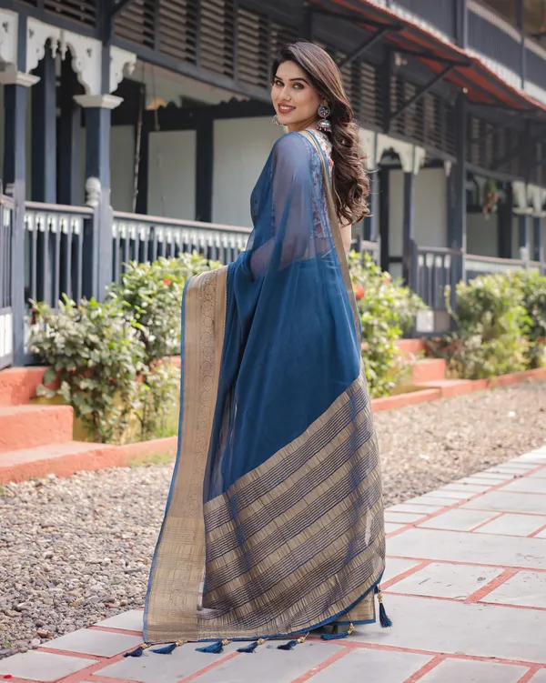 Deep_Navy_Blue_Plain_Chiffon_Saree_with_Gold_Zari_Border,_Floral_Printed_Blouse_&_Tassel_Accents