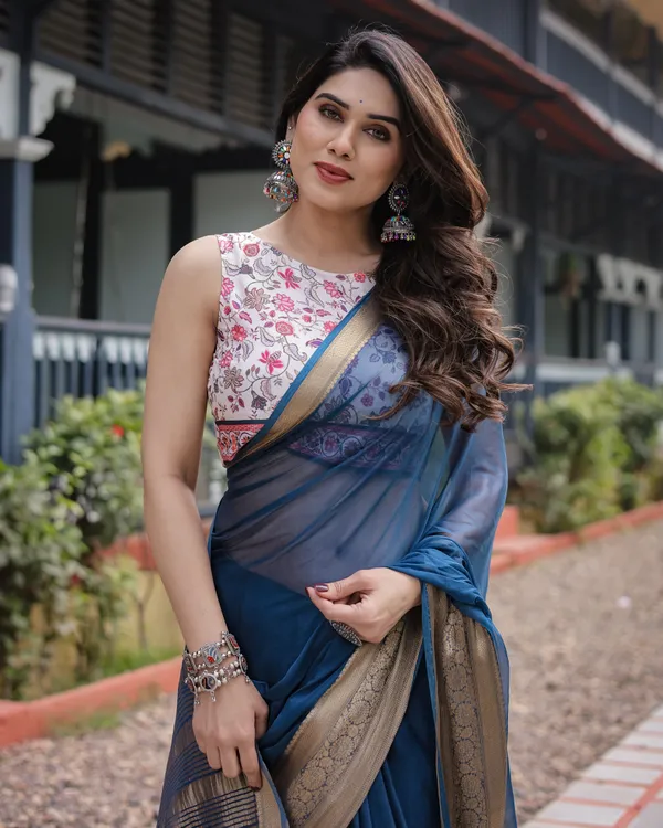 Deep_Navy_Blue_Plain_Chiffon_Saree_with_Gold_Zari_Border,_Floral_Printed_Blouse_&_Tassel_Accents