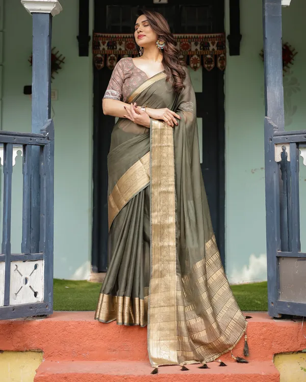 Elegant_Olive_Green_Plain_Chiffon_Saree_with_Gold_Zari_Border,_Floral_Printed_Blouse_&_Tassel_Detailing