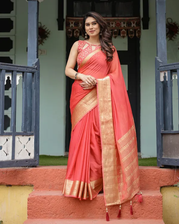 Graceful_Coral_Pink_Plain_Chiffon_Saree_with_Gold_Zari_Border,_Floral_Embroidered_Blouse_&_Tassel_Detailing