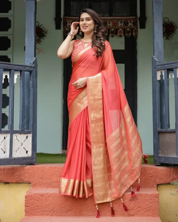 Graceful_Coral_Pink_Plain_Chiffon_Saree_with_Gold_Zari_Border,_Floral_Embroidered_Blouse_&_Tassel_Detailing