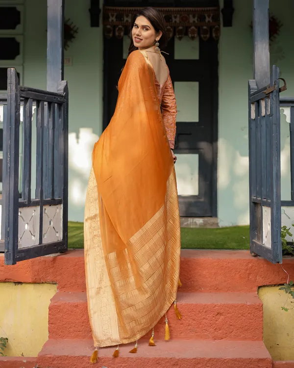 Sunset_Orange_Plain_Chiffon_Saree_with_Gold_Zari_Border,_Floral_Embroidered_Blouse_&_Tassel_Detailing