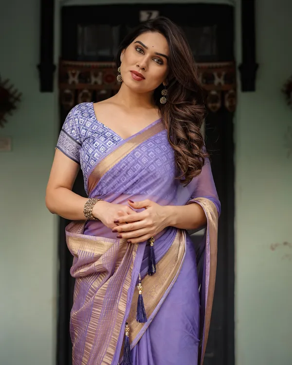 Lavender_Plain_Chiffon_Saree_with_Gold_Zari_Border,_Geometric_Printed_Blouse_&_Tassel_Detailing