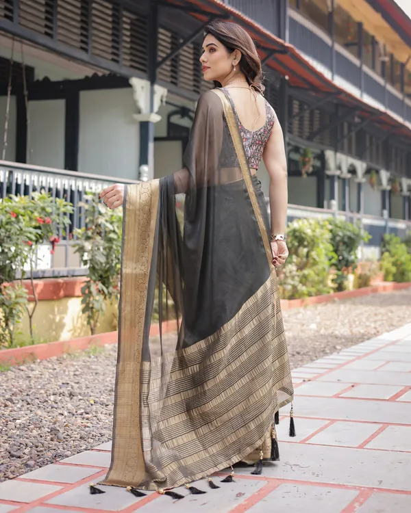 Ethereal_Black_Plain_Chiffon_Saree_with_Gold_Zari_Border,_Floral_Printed_Blouse_&_Tassel_Detailing