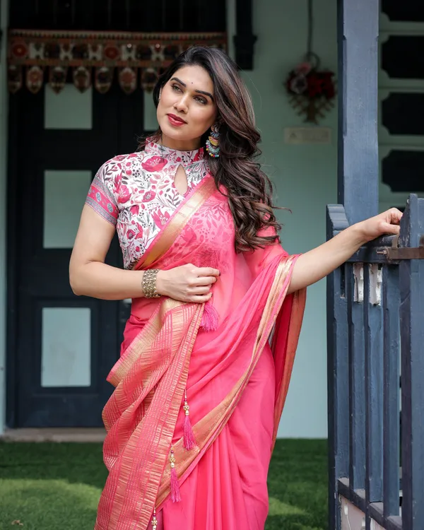 Raspberry_Pink_Plain_Chiffon_Saree_with_Gold_Zari_Border,_High-Neck_Floral_Printed_Blouse_&_Tassel_Detailing