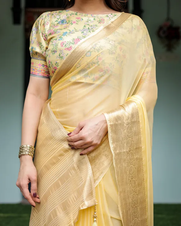 Sunshine_Yellow_Plain_Chiffon_Saree_with_Gold_Zari_Border_and_Floral_Puff_Sleeve_Blouse