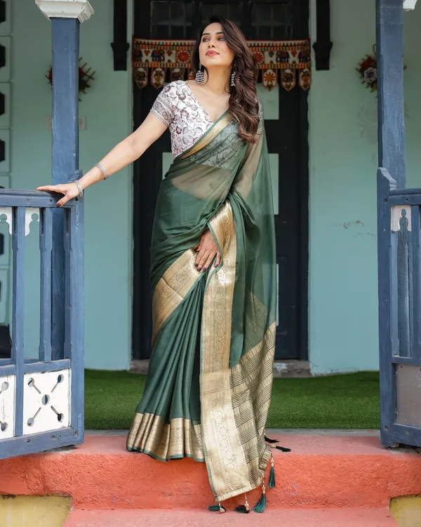 Elegant_Bottle_Green_Plain_Chiffon_Saree_with_Gold_Zari_Border,_Floral_Printed_Blouse_&_Tassel_Finishing