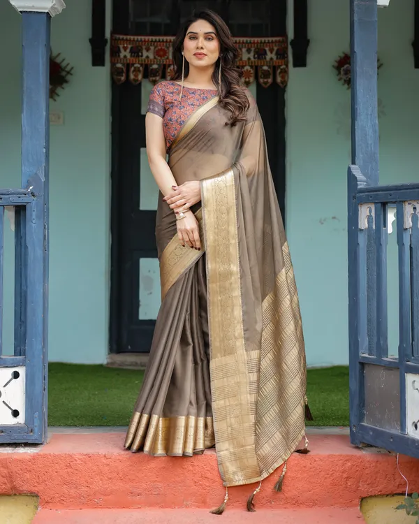 Elegant_Olive_Brown_Plain_Chiffon_Saree_with_Gold_Zari_Border,_Paisley_Printed_Blouse_&_Tassel_Detailing