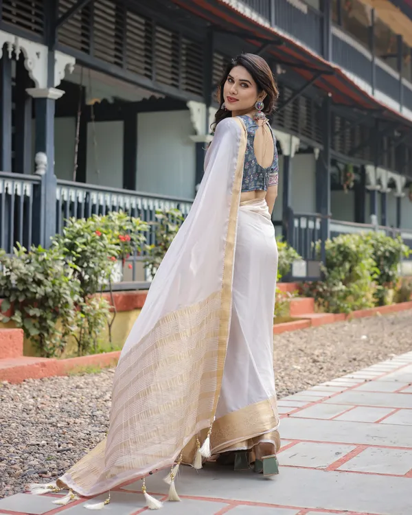 Ivory_White_Plain_Chiffon_Saree_with_Gold_Zari_Border,_Floral_Printed_Blouse_&_Tassel_Detailing