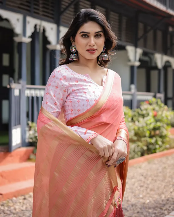 Peach_Pink_Plain_Chiffon_Saree_with_Gold_Zari_Border,_Geometric_Printed_Blouse_&_Tassel_Detailing