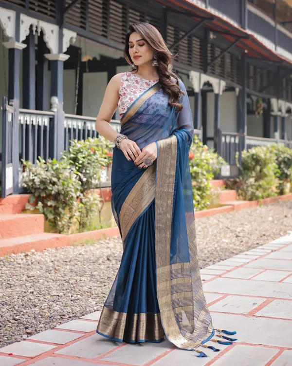 Deep_Navy_Blue_Plain_Chiffon_Saree_with_Gold_Zari_Border,_Floral_Printed_Blouse_&_Tassel_Accents