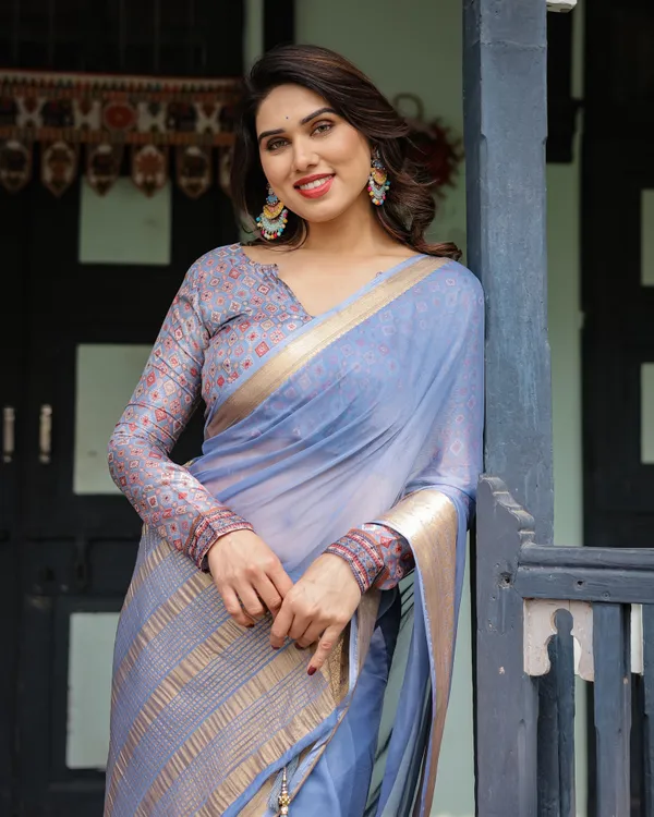 Sky_Blue_Plain_Chiffon_Saree_with_Gold_Zari_Border,_Geometric_Printed_Blouse_&_Tassel_Detailing