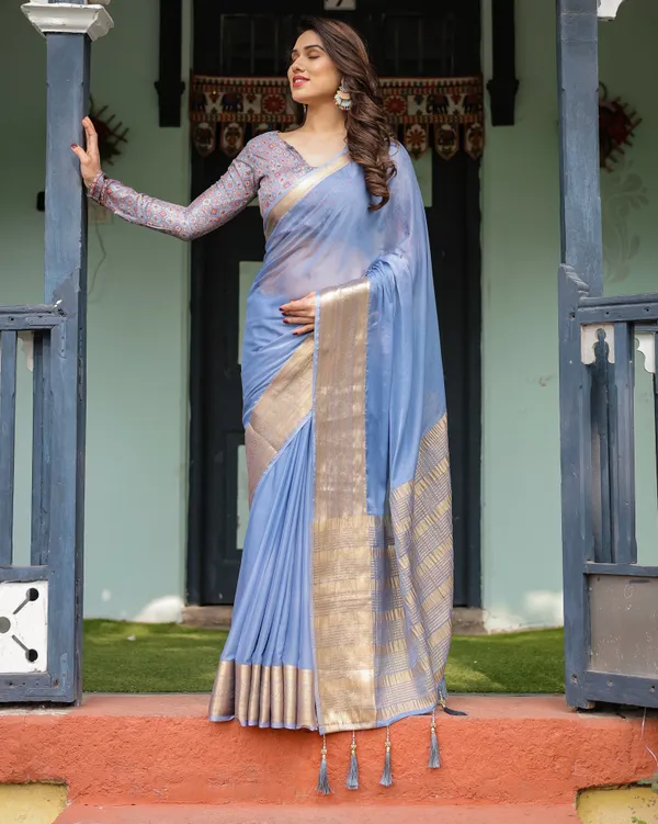 Sky_Blue_Plain_Chiffon_Saree_with_Gold_Zari_Border,_Geometric_Printed_Blouse_&_Tassel_Detailing