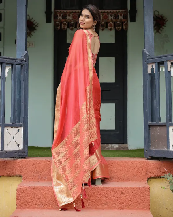 Graceful_Coral_Pink_Plain_Chiffon_Saree_with_Gold_Zari_Border,_Floral_Embroidered_Blouse_&_Tassel_Detailing