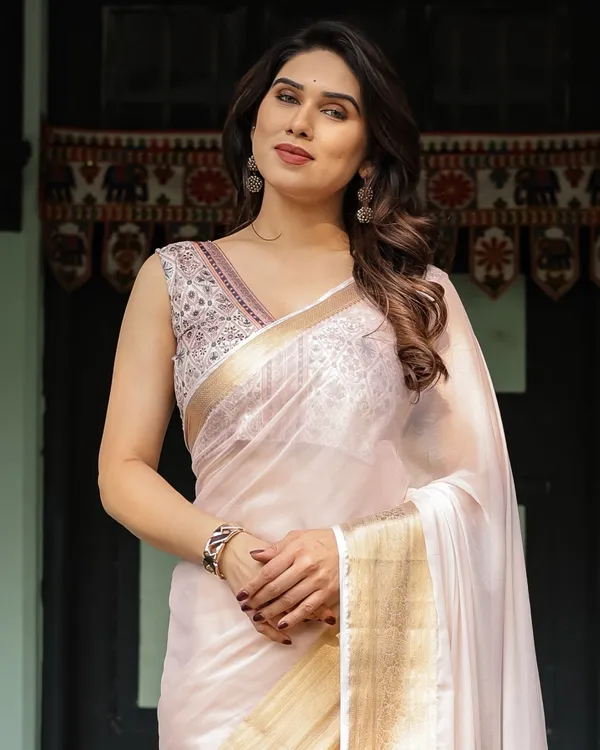 Ethereal_Off-White_Plain_Chiffon_Saree_with_Gold_Zari_Border,_Intricate_Floral_Printed_Blouse_&_Tassel_Detailing