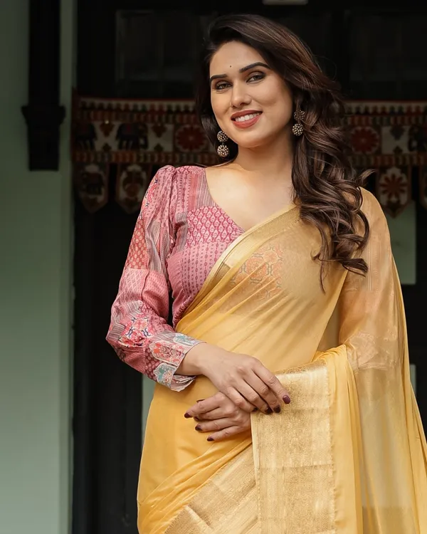 Radiant_Mustard_Yellow_Plain_Chiffon_Saree_with_Gold_Zari_Border,_Printed_Designer_Blouse_&_Tassel_Detailing