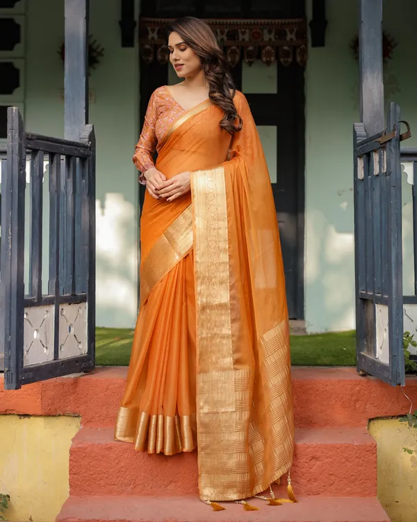 Sunset_Orange_Plain_Chiffon_Saree_with_Gold_Zari_Border,_Floral_Embroidered_Blouse_&_Tassel_Detailing
