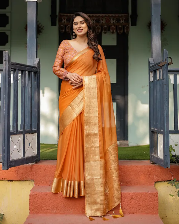Sunset_Orange_Plain_Chiffon_Saree_with_Gold_Zari_Border,_Floral_Embroidered_Blouse_&_Tassel_Detailing