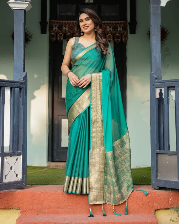 Elegant_Sea_Green_Plain_Chiffon_Saree_with_Gold_Zari_Border,_Paisley_Printed_Blouse_&_Tassel_Detailing