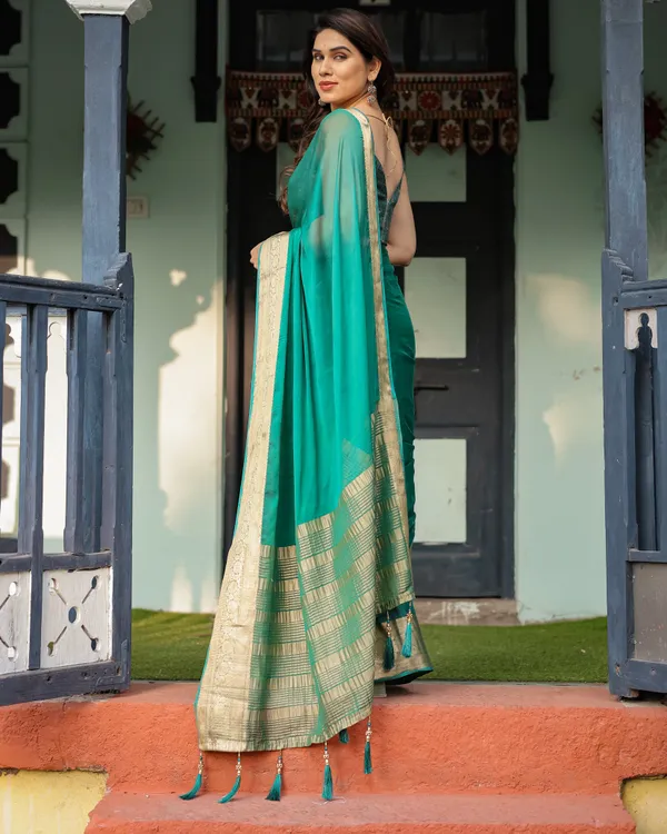 Elegant_Sea_Green_Plain_Chiffon_Saree_with_Gold_Zari_Border,_Paisley_Printed_Blouse_&_Tassel_Detailing