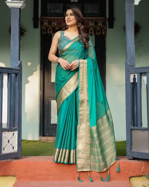 Elegant_Sea_Green_Plain_Chiffon_Saree_with_Gold_Zari_Border,_Paisley_Printed_Blouse_&_Tassel_Detailing