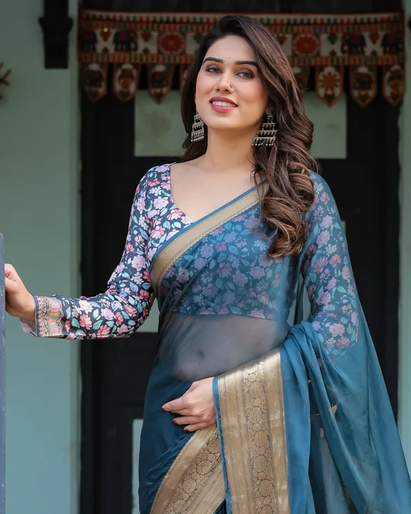 Teal_Blue_Plain_Chiffon_Saree_with_Gold_Zari_Border,_Floral_Printed_Blouse_&_Tassel_Detailing
