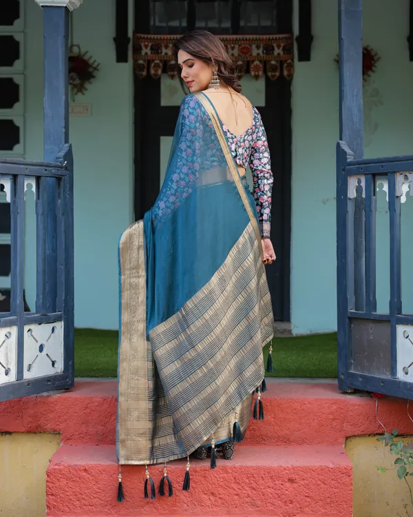 Teal_Blue_Plain_Chiffon_Saree_with_Gold_Zari_Border,_Floral_Printed_Blouse_&_Tassel_Detailing