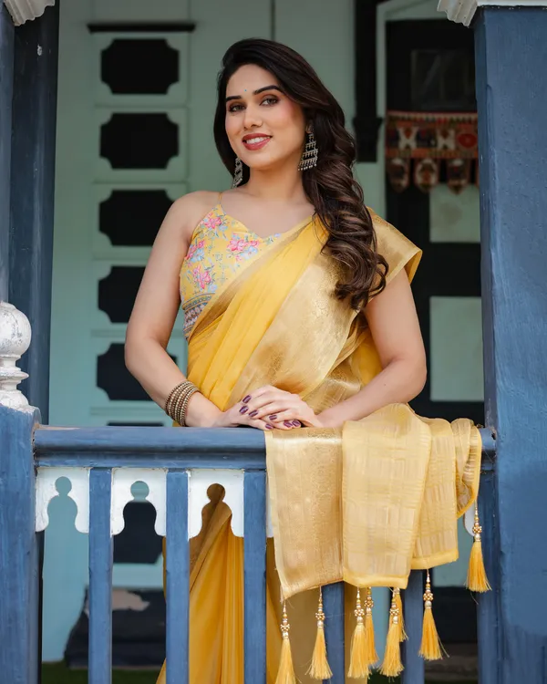 Golden_Yellow_Plain_Chiffon_Saree_with_Gold_Zari_Border,_Floral_Printed_Blouse_&_Tassel_Detailing