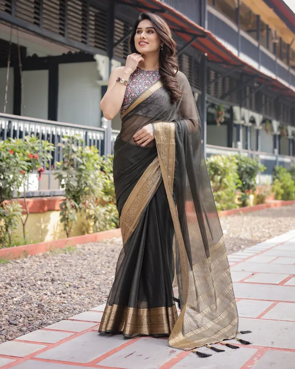Ethereal_Black_Plain_Chiffon_Saree_with_Gold_Zari_Border,_Floral_Printed_Blouse_&_Tassel_Detailing