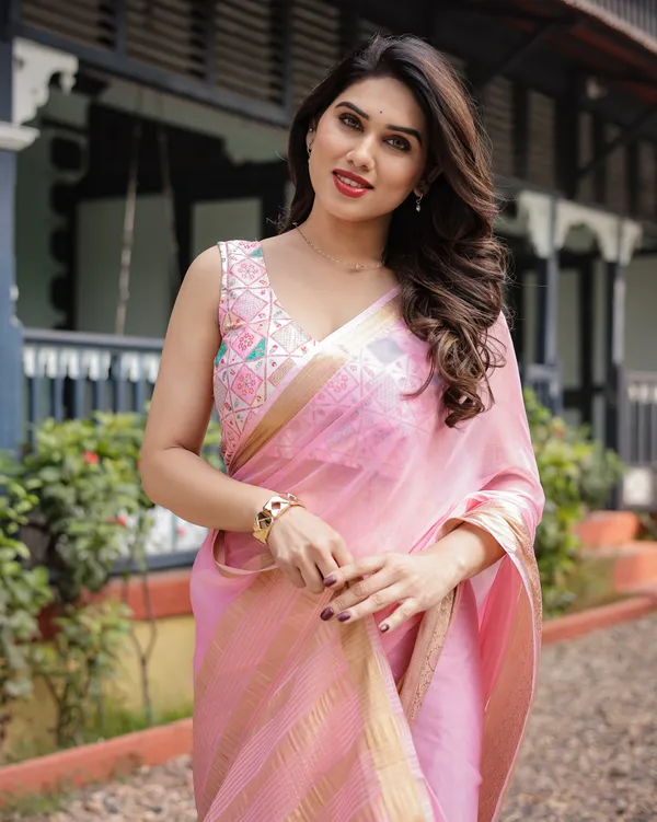 Soft_Baby_Pink_Plain_Chiffon_Saree_with_Gold_Zari_Border,_Geometric_Embroidered_Blouse_&_Tassel_Detailing