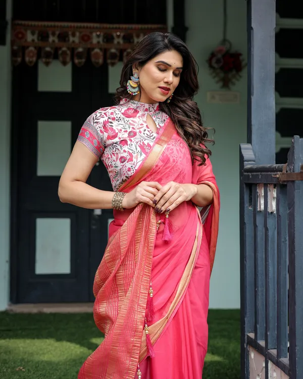 Raspberry_Pink_Plain_Chiffon_Saree_with_Gold_Zari_Border,_High-Neck_Floral_Printed_Blouse_&_Tassel_Detailing
