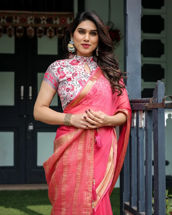 Raspberry_Pink_Plain_Chiffon_Saree_with_Gold_Zari_Border,_High-Neck_Floral_Printed_Blouse_&_Tassel_Detailing