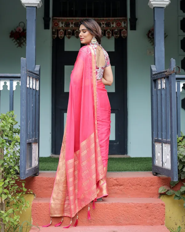 Raspberry_Pink_Plain_Chiffon_Saree_with_Gold_Zari_Border,_High-Neck_Floral_Printed_Blouse_&_Tassel_Detailing