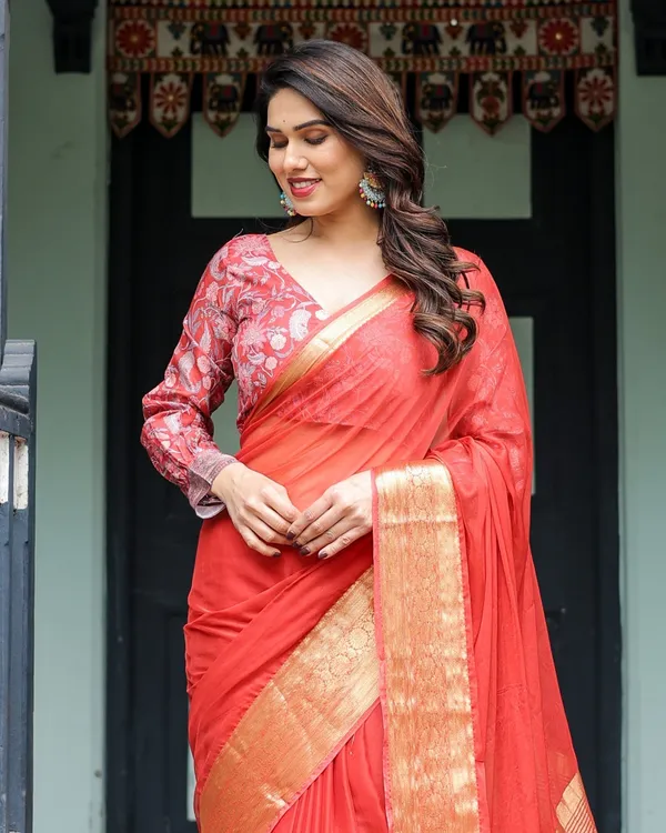 Fiery_Red_Plain_Chiffon_Saree_with_Gold_Zari_Border,_Full-Sleeve_Floral_Blouse_&_Tassel_Detailing