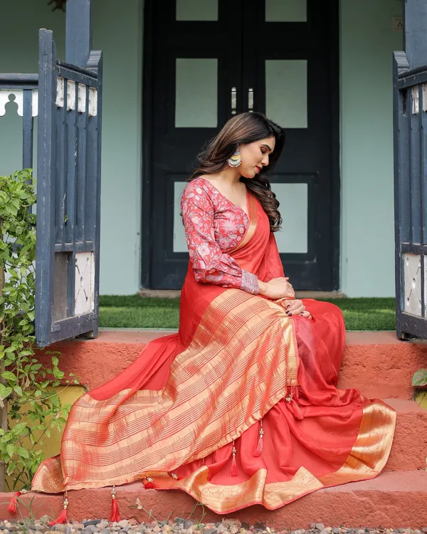 Fiery_Red_Plain_Chiffon_Saree_with_Gold_Zari_Border,_Full-Sleeve_Floral_Blouse_&_Tassel_Detailing