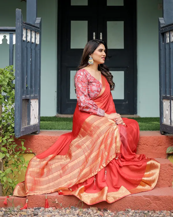 Fiery_Red_Plain_Chiffon_Saree_with_Gold_Zari_Border,_Full-Sleeve_Floral_Blouse_&_Tassel_Detailing