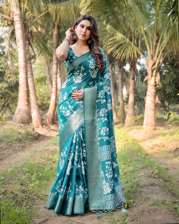Teal_Blue_Tussar_Silk_Saree_with_White_Floral_Design,_Gold_Zari_Border_&_Tassel_Pallu
