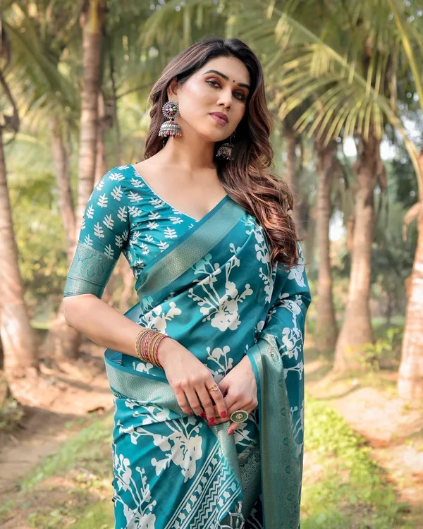 Teal_Blue_Tussar_Silk_Saree_with_White_Floral_Design,_Gold_Zari_Border_&_Tassel_Pallu