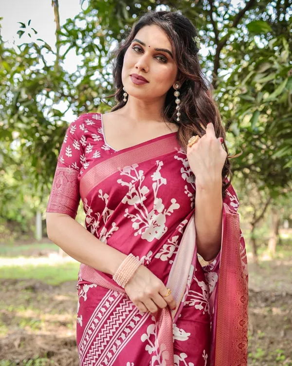 Maroon_Tussar_Silk_Saree_with_White_Floral_Motifs,_Intricate_Zari_Border,_and_Elegant_Tassel_Pallu