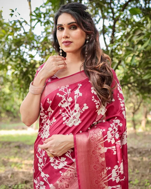 Maroon_Tussar_Silk_Saree_with_White_Floral_Motifs,_Intricate_Zari_Border,_and_Elegant_Tassel_Pallu