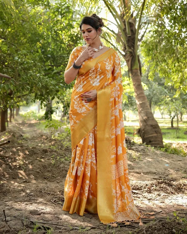Sunshine_Yellow_Tussar_Silk_Saree_with_White_Floral_Motifs,_Lustrous_Zari_Border,_and_Graceful_Tassel_Pallu
