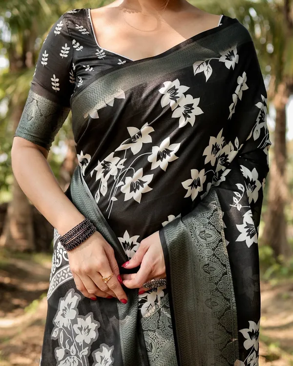 Elegant_Black_Tussar_Silk_Saree_with_Zari_Embellished_Border_and_Bold_Floral_Pallu