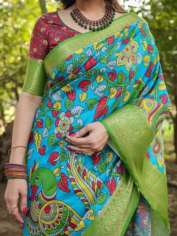 Vibrant_Peacock_Motif_Blue_and_Green_Tussar_Silk_Saree_with_Zari_Border