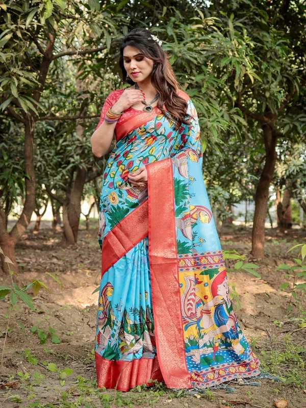 Aqua_Blue_Tussar_Silk_Saree_with_Vibrant_Nature-Inspired_Prints_and_Red_Zari_Border