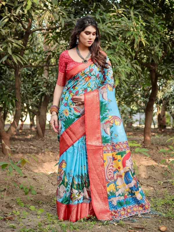 Aqua_Blue_Tussar_Silk_Saree_with_Vibrant_Nature-Inspired_Prints_and_Red_Zari_Border