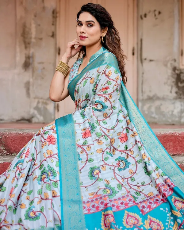 Sky_Blue_Tussar_Silk_Saree_with_Multicolor_Floral_Design_and_Zari_Paisley_Border