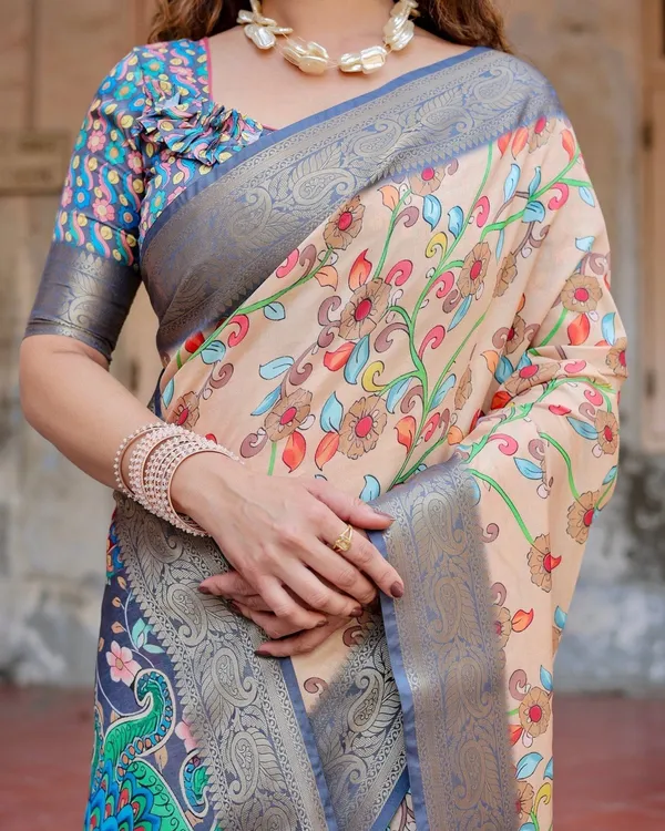 Peach_and_Navy_Blue_Floral_Saree_with_Vibrant_Peacock_Pallu_and_Tassel_Detailing