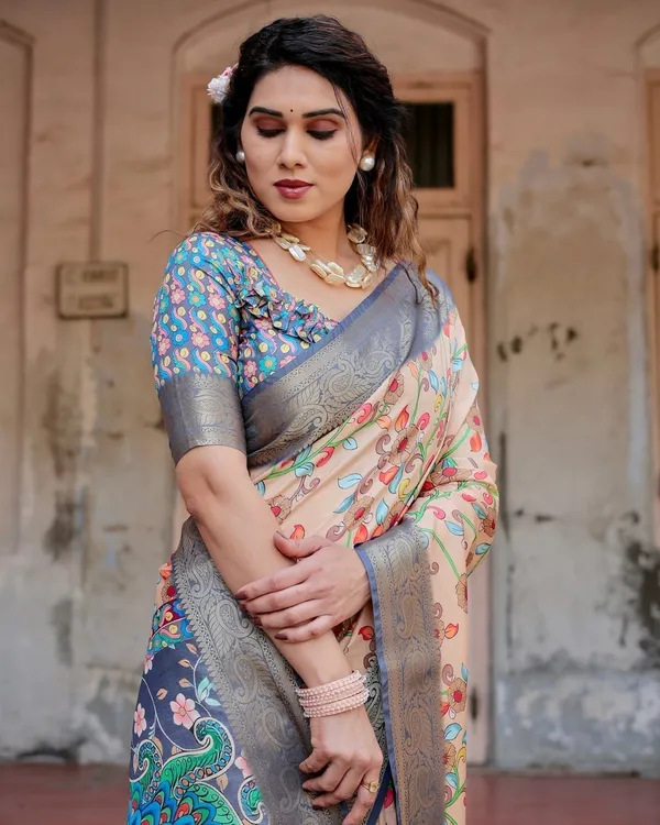 Peach_and_Navy_Blue_Floral_Saree_with_Vibrant_Peacock_Pallu_and_Tassel_Detailing