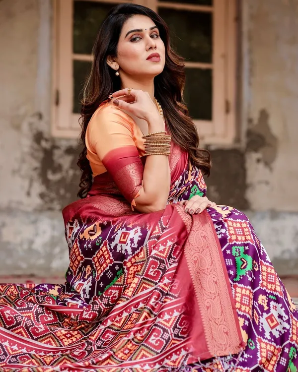 Wine_Purple_Tussar_Silk_Saree_with_Ikat-Inspired_Patterns_and_Rich_Zari_Border